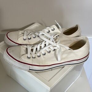 Stylish Cream Canvas Sneakers with Red Accents